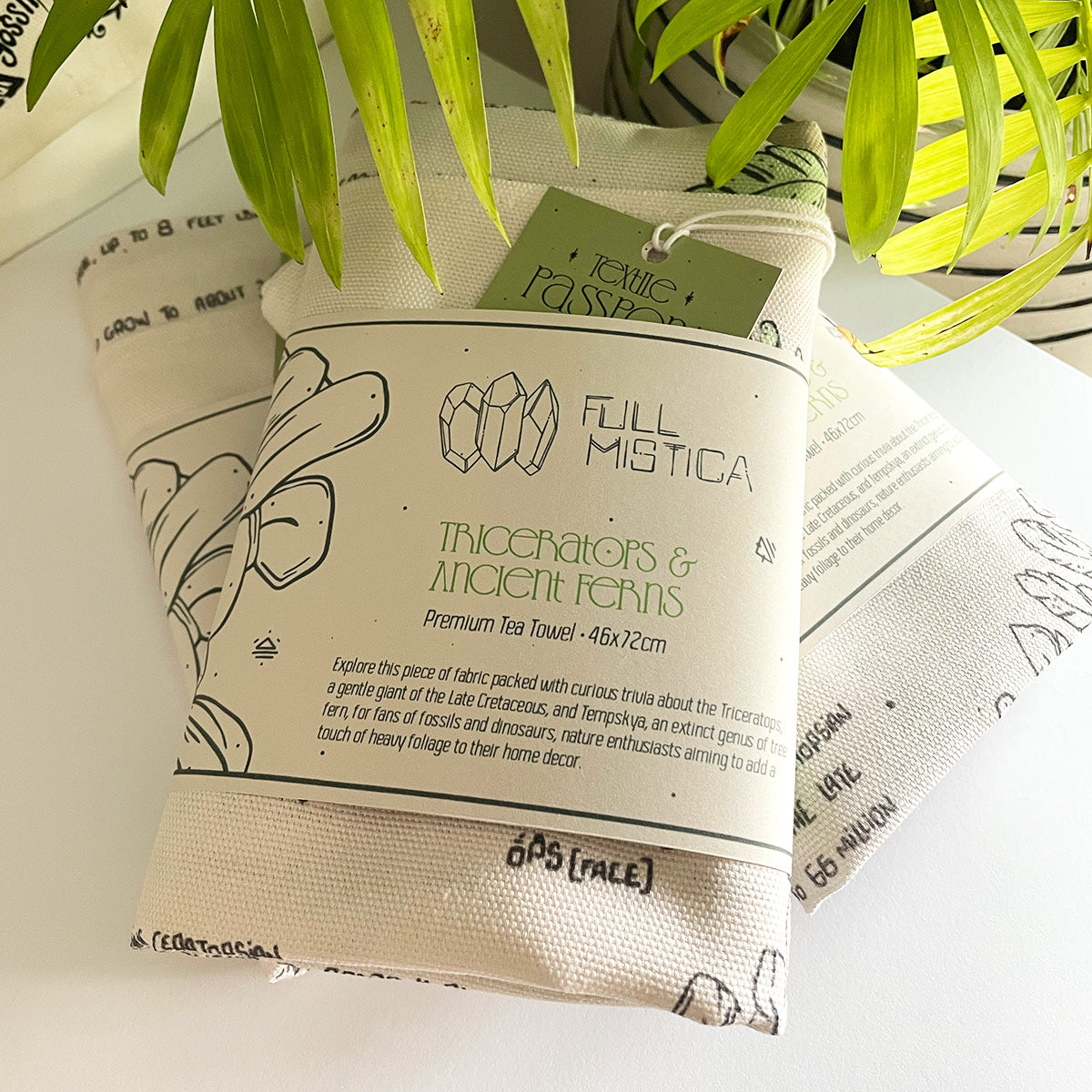 manchester and york museums gift shop triceratops dinosaur tea towel, folded illustrated fabric, curious facts