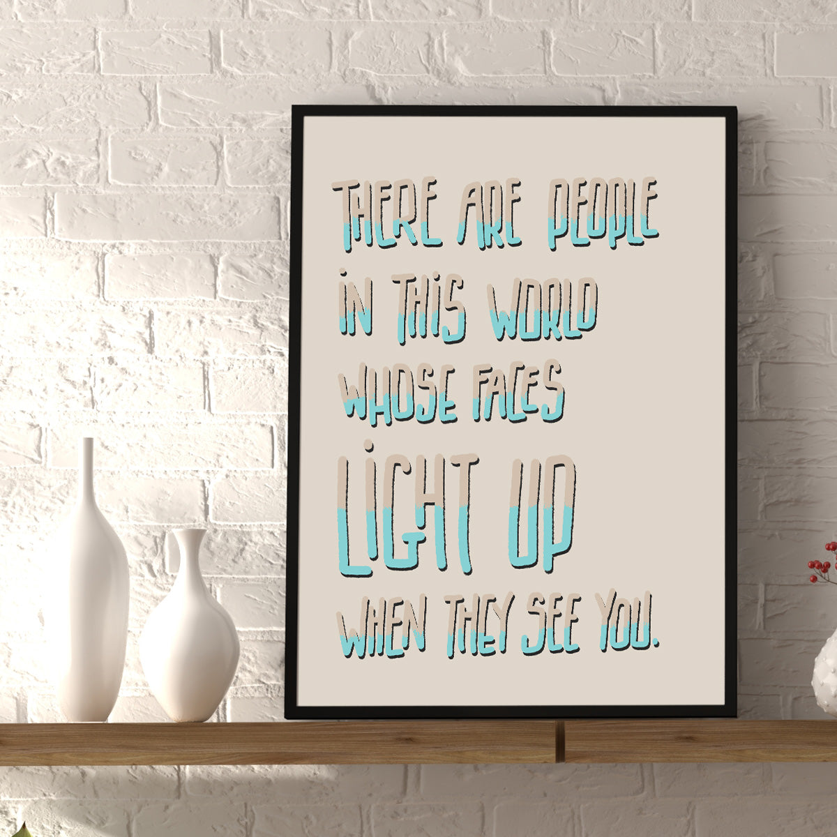 art print sitting on wooden shelf, design of heartfelt text about an amazing person. Tall type handdrawn in cream and turquoise with black shade, light cream background