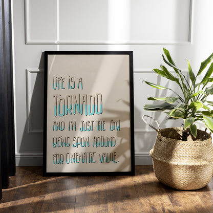 Art print framed sitting on wooden floor. Funny text about life in tall hand drawn letters in cream and turquoise light cream background